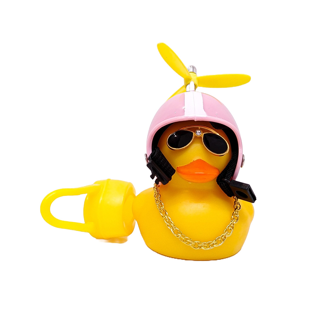 PATITO DECORATIVO PARA AUTO, BICI O MOTO CASCO ROSA DIBUJO RACING CON ANTEOJOS, CADENA Y HELICE